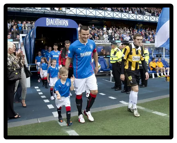 Rangers Football Club: Celebrating a 5-0 Victory Over East Fife with Captain Lee McCulloch