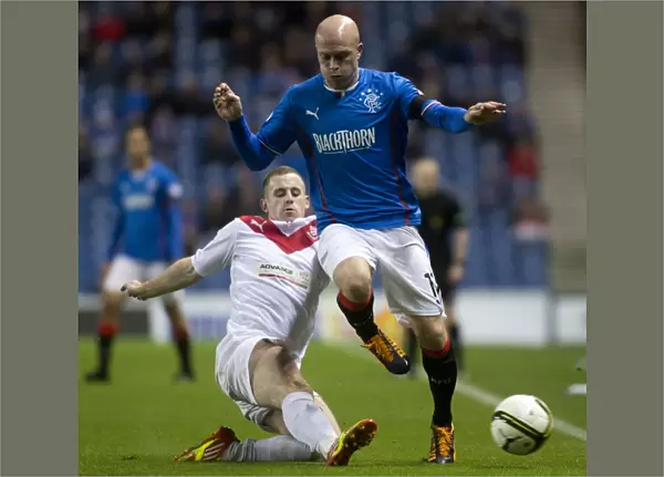 Rangers Triumph: Nicky Law Scores Brace as Rangers Defeat Airdrieonians 3-0 in Scottish Cup at Ibrox Stadium