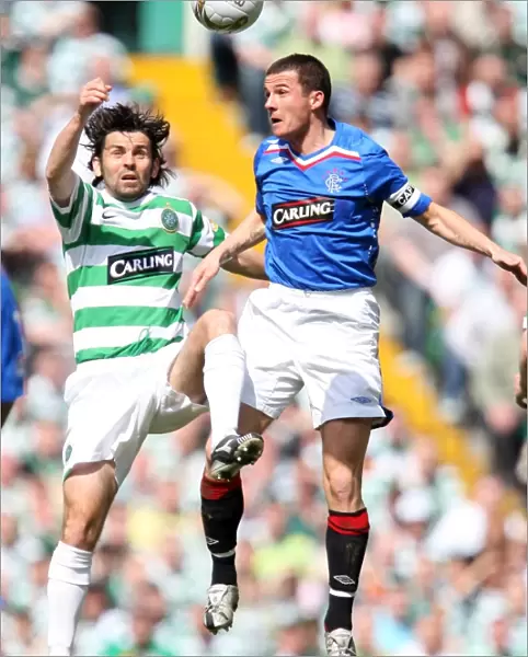 Clash at Celtic Park: Hartley vs. Ferguson - Intense Aerial Battle (Celtic 3-2 Rangers)