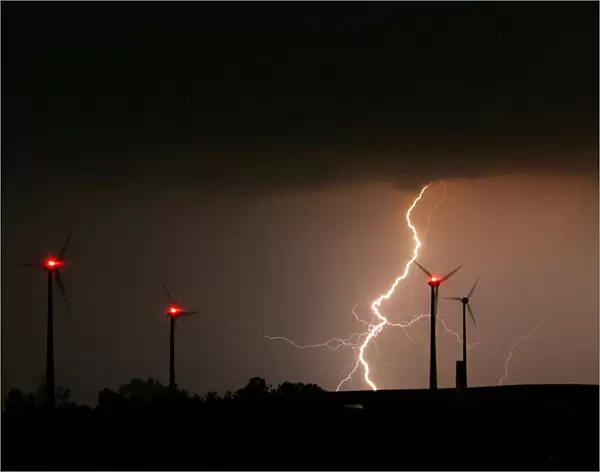 Lightning bolt strikes during a thunderstorm over the eastern German village Schleiz