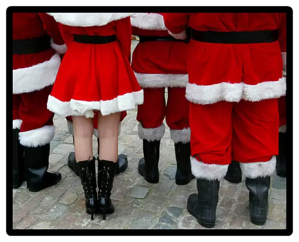 Professional Santa Claus performers attend a training day in London