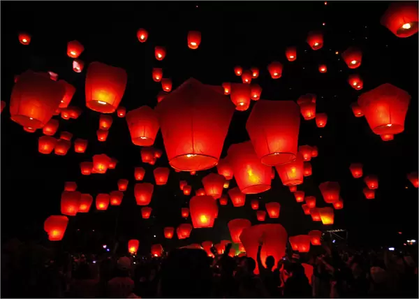 People release sky lanterns to celebrate the traditional Chinese Lantern Festival in Shifen