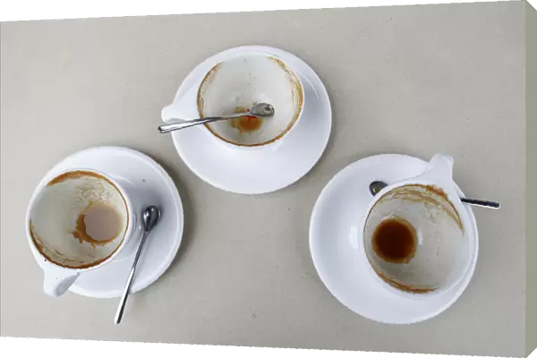 Three empty cups on a table are pictured at the Silver lake location of Intelligentsia Coffee