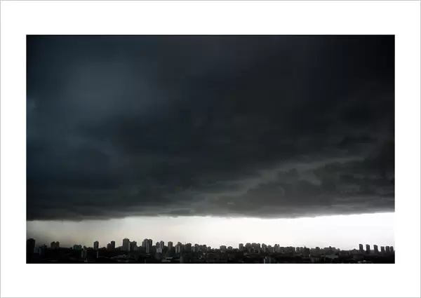 Rain clouds gather over the city of Sao Paulo