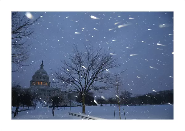 A general view of the U. S. Capitol in early morning snow in Washington