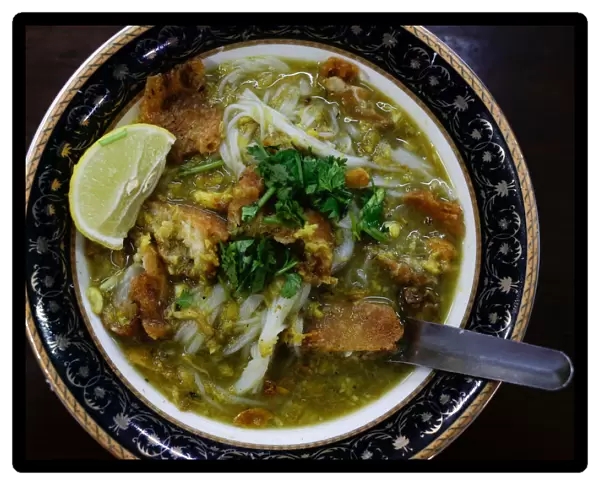 A mohinga, a traditional breakfast rice-noodle dish with fish soup, is pictured at