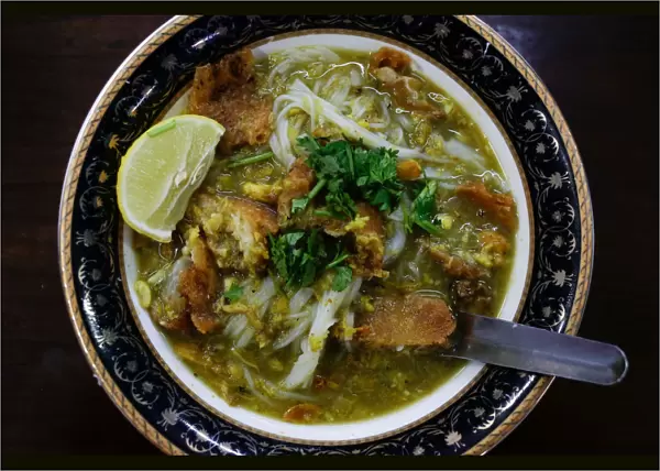 A mohinga, a traditional breakfast rice-noodle dish with fish soup, is pictured at
