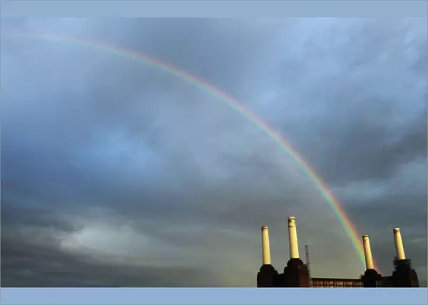 A rainbow stretches over Battersea Power Station in London