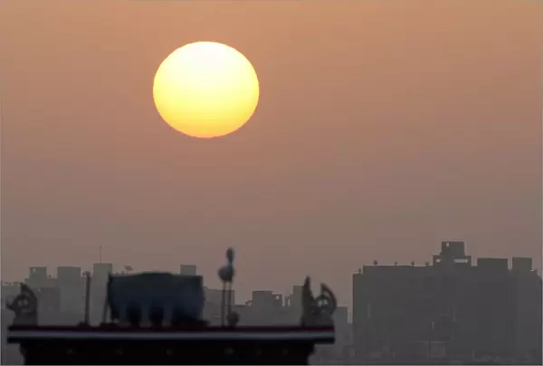 The sun rises in Cairo