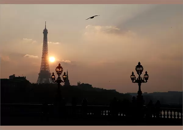 The Eiffel tower is pictured as the sun sets on a winter day in Paris