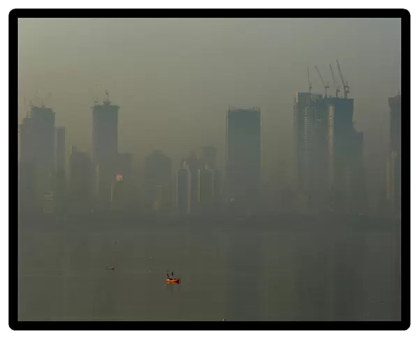Buildings are seen shrouded in smog in Mumbai