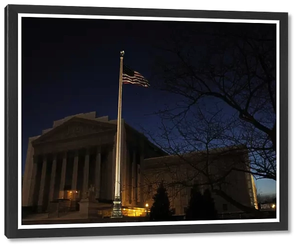 The United States Supreme Court is seen before dawn in Washington