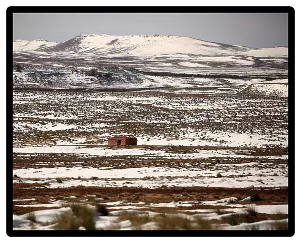 A house is pictured on the outskirts of Al Bayadh in the high steppe region of south