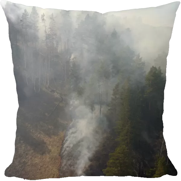 An aerial view shows a forest fire in the Siberian Taiga area outside Krasnoyarsk