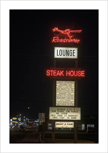 Neon Roadrunner sign outside restaurant in Socorro New Mexico USA