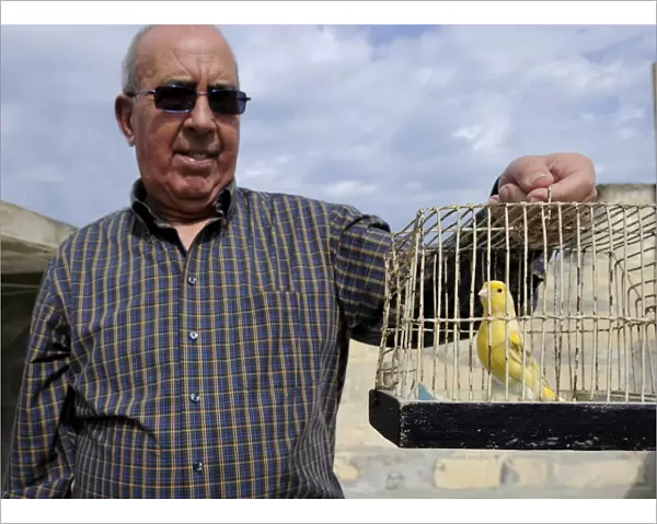 Albert Dimech with one of his Canaries Malta - Albert has been a keen bird keeper