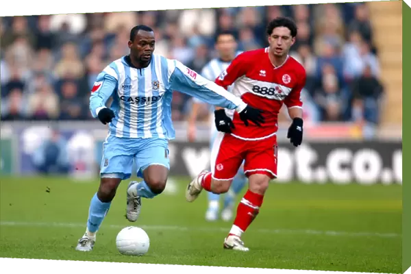 Stern John Surges Past Fabio Rochemback: Coventry City vs. Middlesbrough in FA Cup Fourth Round, Ricoh Arena (2006)