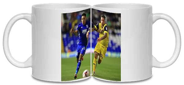 Intense Rivalry: Dacres-Cogley vs Maguire Battle for Possession - Birmingham City vs Oxford United (EFL Cup)