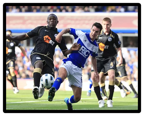 Clash of Titans: Thomas vs. Ridgewell in the Premier League Showdown between Birmingham City and Wigan Athletic (September 25, 2010, St. Andrew's)