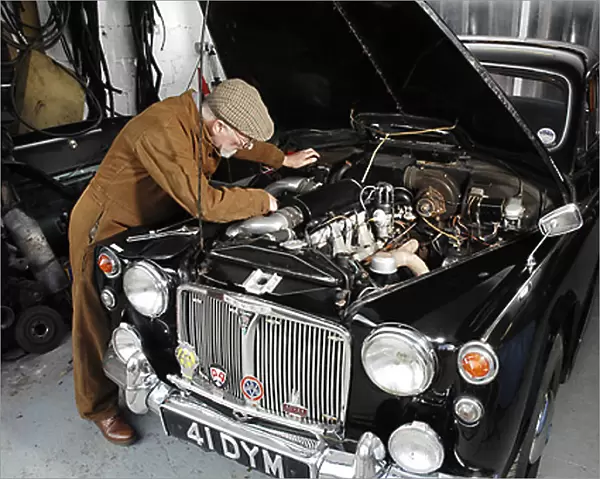 Rover Owner working on engine