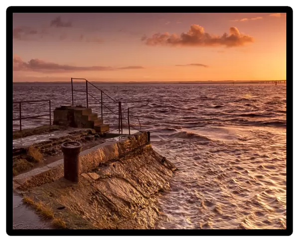View of jetty at sunrise, Sudbrook Jetty, River Severn, Severn Estuary, Monmouthshire, Wales, January