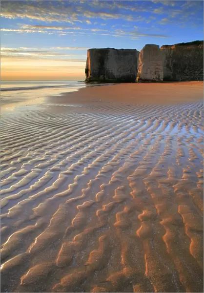 View of sandy beach and chalk cliffs at sunrise, Botany Bay, Kent, England, may