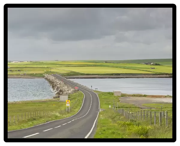 Road on causeway linking islands, originally built to close entrance and protect Scapa Flow, Churchill Barrier