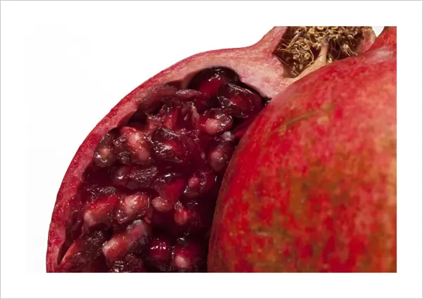 Pomegranate (Punica granatum) close-up of sliced fruit