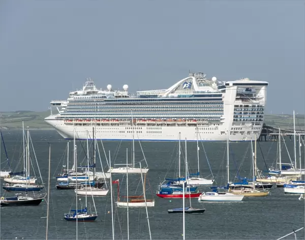 Caribbean Princess cruise ship at harbour, with yachts in foreground, Holyhead, Holy Island, Anglesey, Wales, August