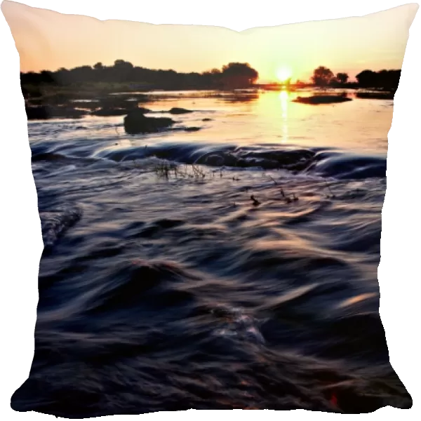 View of river at sunset, Chobe River, Chobe N. P. Botswana, July