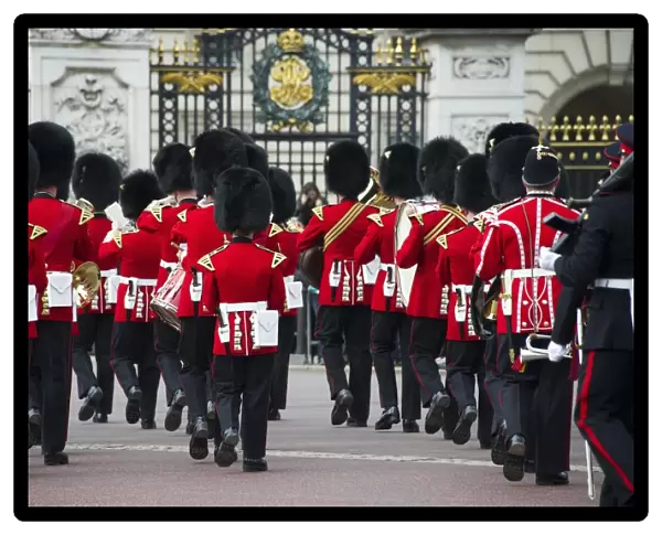 Band of the Welsh Guards guardsmen in ceremonial uniforms, Changing of the Guard outside palace, Buckingham Palace