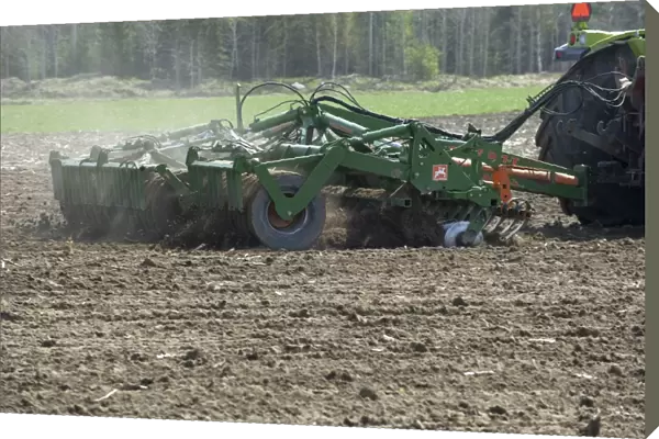 Amazone Catros 5501-T disc harrows, harrowing arable field, Sweden, may