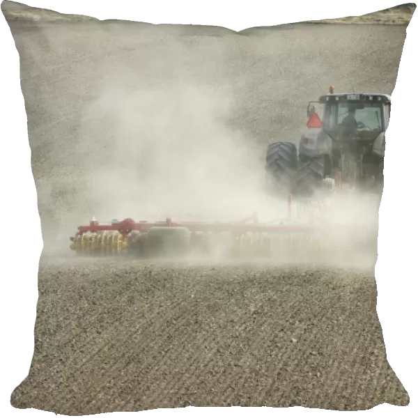 Valtra tractor with Vaderstad NZA-800 and Vaderstad RS-820 harrows and rollers, cultivating dusty arable field, Sweden