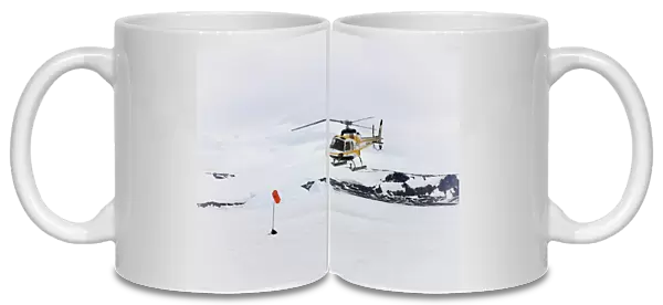 Tourists in helicopter, landing on snow, Devil Island, Weddell Sea, Antarctica, December