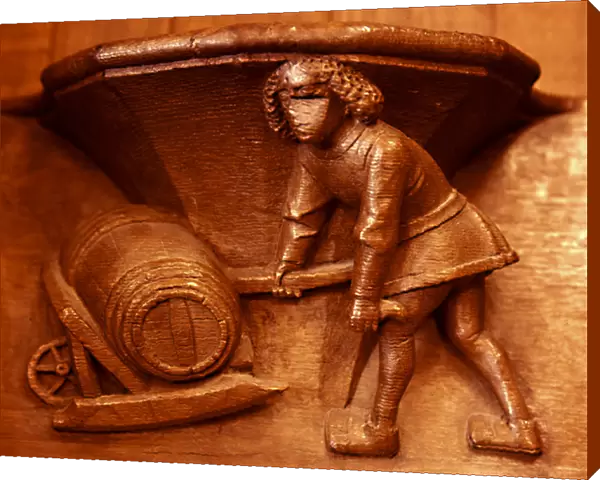 Misericord from Beauvais. Cooper. Barrel on a wheel-barrow. 15th cent