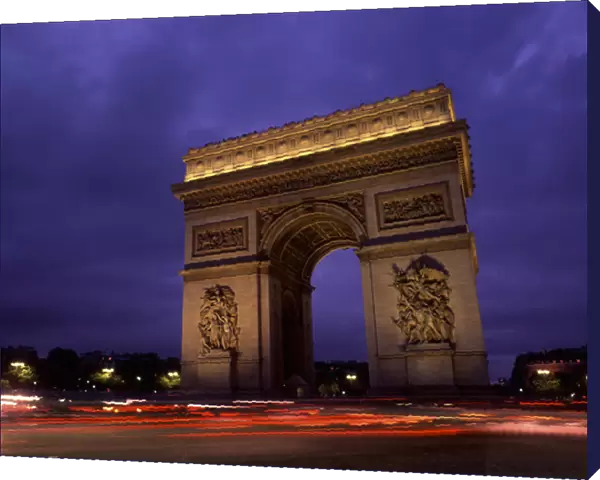 Paris, France. Famous Arc de Triomphe Monument at Sunset