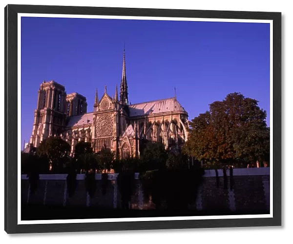 Paris, France. The Famous Notre Dame Cathedral at Sunset