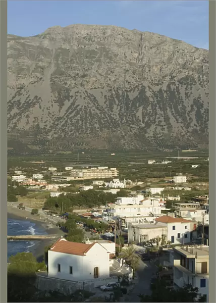 GREECE-CRETE-Lasithi Province-Pachia Ammos: Coastal Village View and Mt. Orno  /  Late