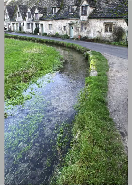 Europe, England, Gloucestershire, stream flowing through Cotswolds villiage