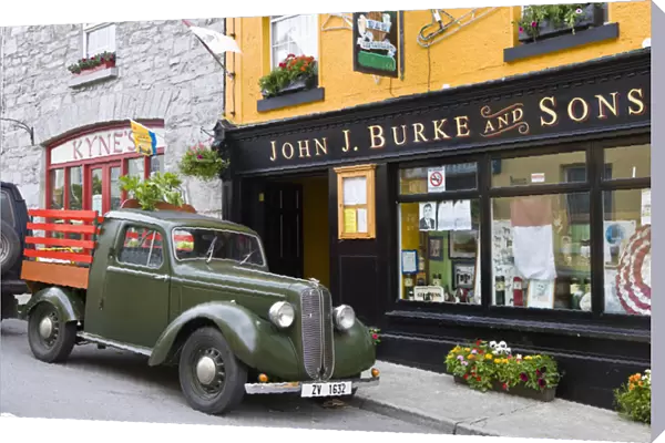 Clonbur, Ireland. An old truck sits outside John Burkes, a well-known restaurant