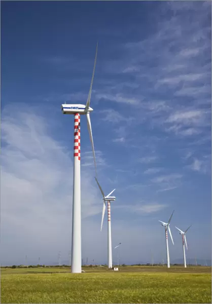ITALY, Sardinia, Porto Torres. Wind farm and power plant
