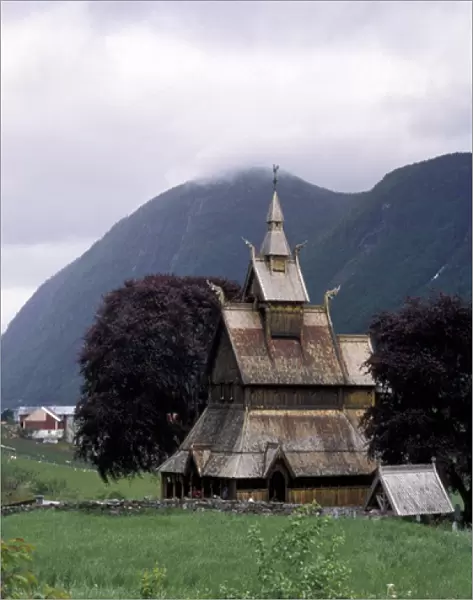 EU, Norway, Stavkirche (wooden church) built between 12th and 14th century, nearby