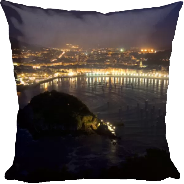 La Concha Bay and the city of Donostia-San Sebastian at night, Guipuzcoa, Basque Country