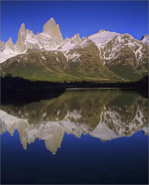 Cerro Fitzroy at sunrise with reflection in pothole lake, Los Glaciares National park