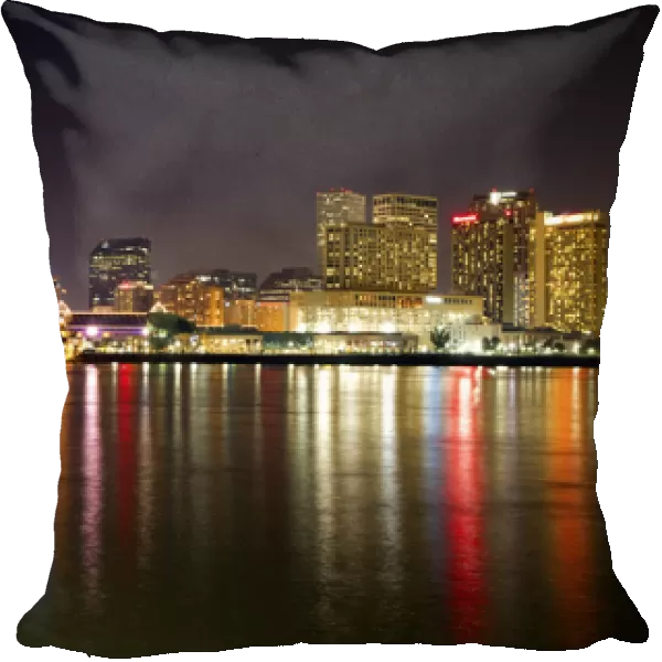 Night skyline of the city of New Orleans along the Mississippi River, Louisiana, USA