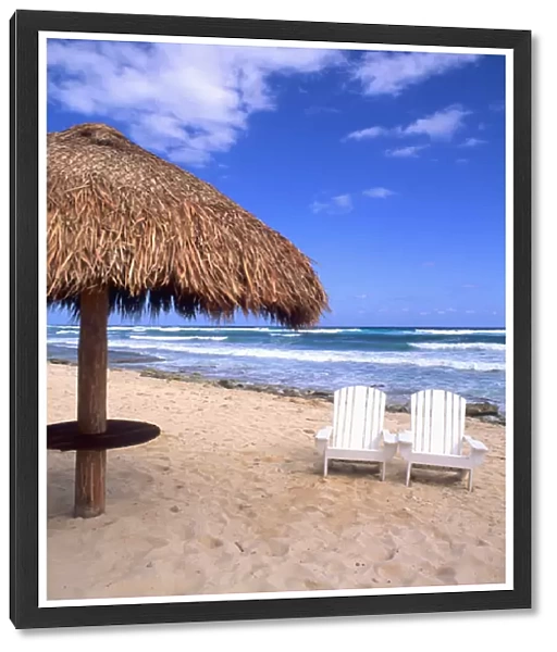 Chairs on beautiful beach in Cozumel Mexico