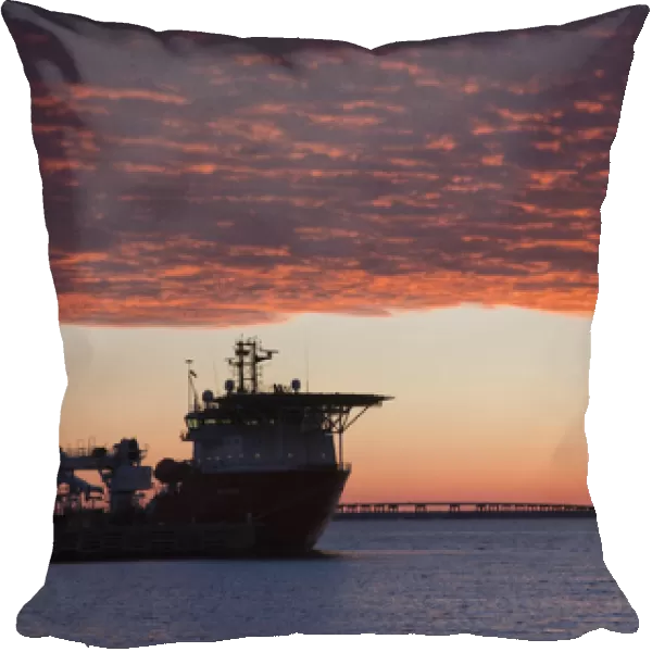 USA, Florida, Florida Panhandle, Pensacola, Port of Pensacola, oil rig supply ship, dawn