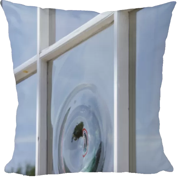 Massachusetts, Nantucket Island. Vintage bullseye glass window