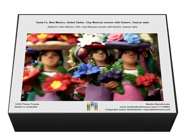 Santa Fe, New Mexico, United States. Clay Mexican women with flowers. Oxacan style