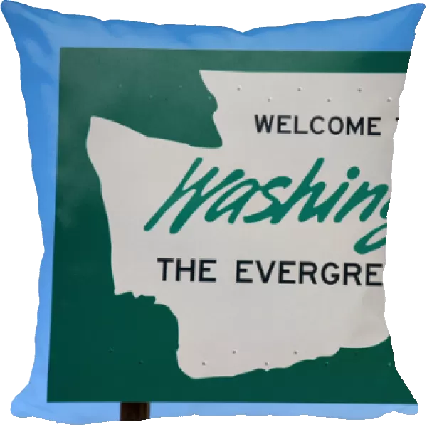A sign welcoming you to Washington state